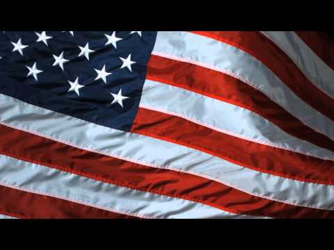 Flagged for Burning Slow Motion USA Flag Waving United States of America Flag Flying in High Definition HD Slowmo Video