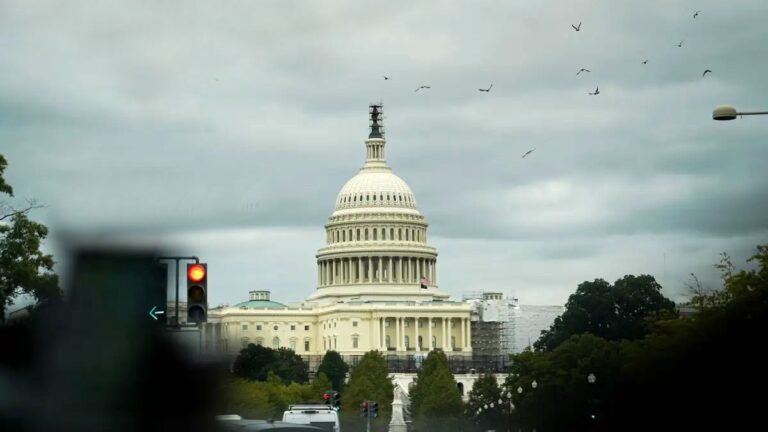 The U.S. Capitol building is seen at sunrise in Washington on July 31, 2023